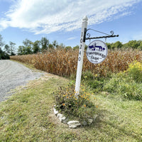 Fingerboard Farm sign at entrance 